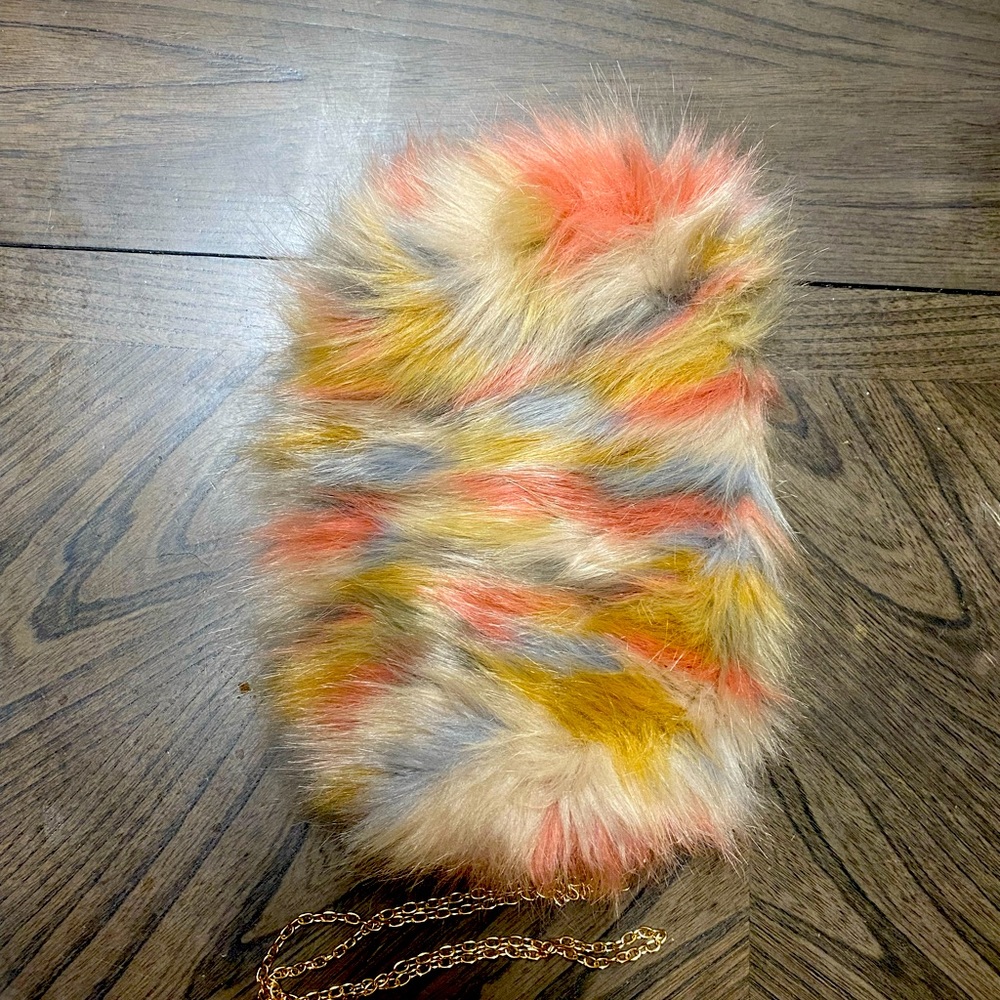Furry multi colored clutch.